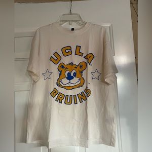 Fun college tee. Size Small-slightly oversized. Used in good condition.
